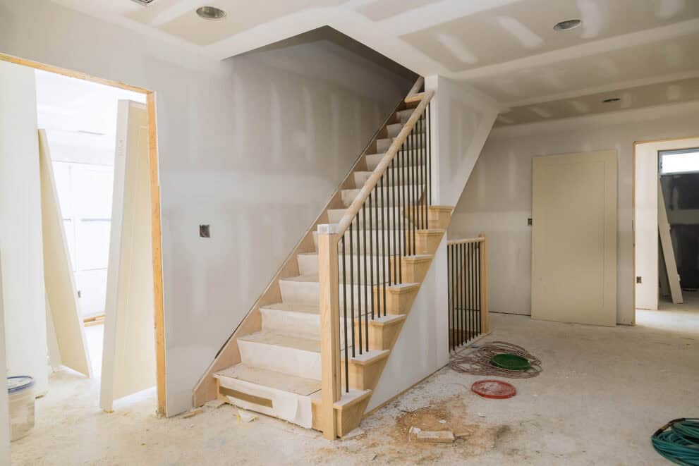 New home installing material for repairs under construction apartment